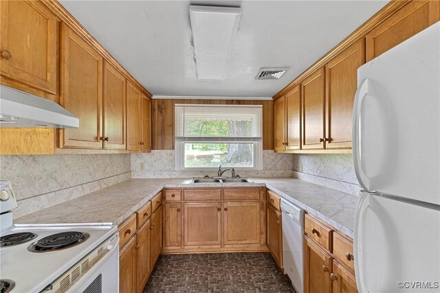 285 Jennings Ordinary Rd, Crewe, VA 23930 - kitchen featuring white appliances, light countertops, tasteful backsplash, and brown cabinets