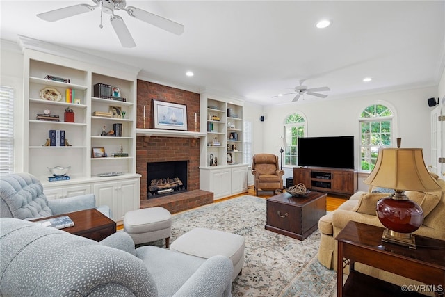 9929 Eildonway Pl, Henrico, VA 23238 - living area with ceiling fan, recessed lighting, light wood-type flooring, crown molding, and a brick fireplace