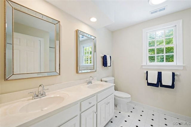 9929 Eildonway Pl, Henrico, VA 23238 - bathroom featuring double vanity, tile patterned floors, and recessed lighting