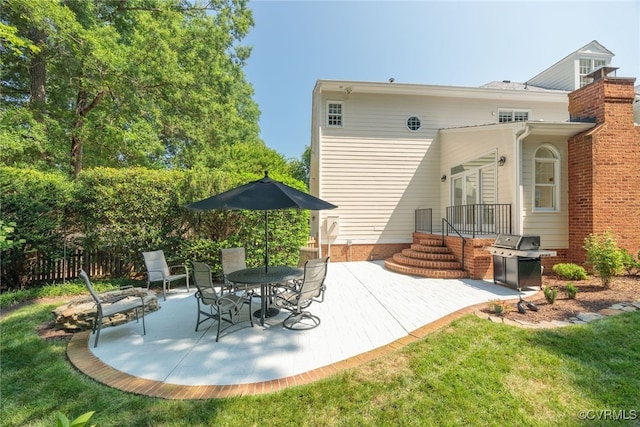 9929 Eildonway Pl, Henrico, VA 23238 - rear view of house featuring a patio and a yard
