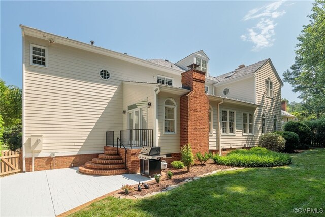 9929 Eildonway Pl, Henrico, VA 23238 - rear view of property featuring a chimney