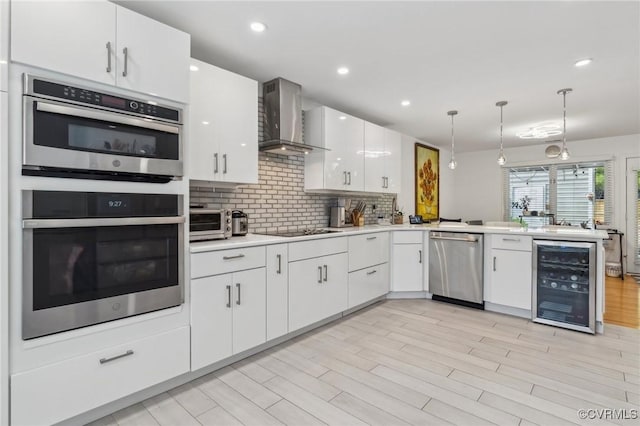 8256 Greystone W Cir, Henrico, VA 23229 - kitchen featuring beverage cooler, appliances with stainless steel finishes, wall chimney exhaust hood, white cabinets, and recessed lighting