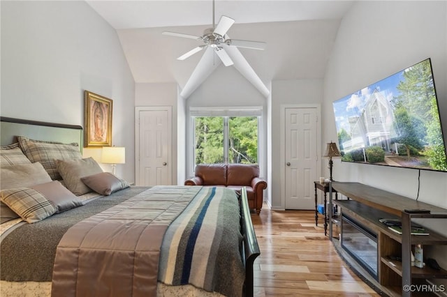 8256 Greystone W Cir, Henrico, VA 23229 - bedroom with light wood-style floors, vaulted ceiling, and a ceiling fan