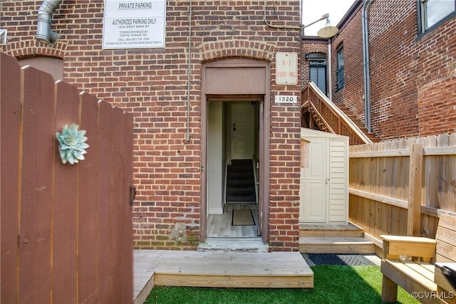 1320 W Main St, Richmond, VA 23220 - doorway to property featuring brick siding