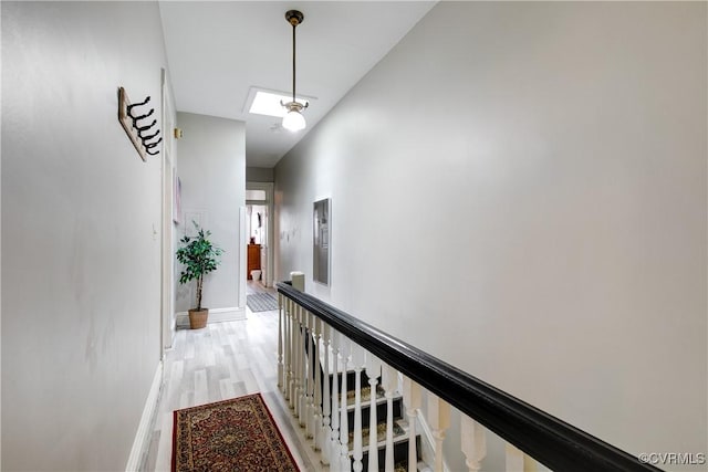 1320 W Main St, Richmond, VA 23220 - hallway with light wood-style flooring and an upstairs landing