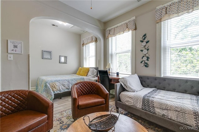 1320 W Main St, Richmond, VA 23220 - bedroom with arched walkways and wood finished floors