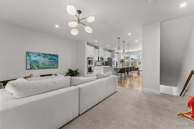 2133 Cantina Ln, Midlothian, VA 23114 - living area with a chandelier, recessed lighting, and light carpet