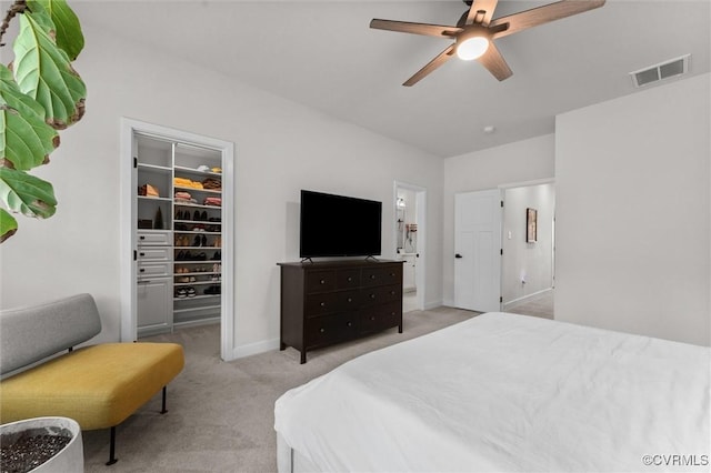2133 Cantina Ln, Midlothian, VA 23114 - bedroom featuring a walk in closet, light colored carpet, and ceiling fan