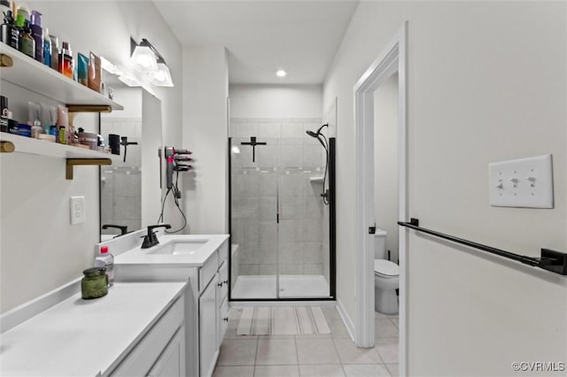 2133 Cantina Ln, Midlothian, VA 23114 - bathroom with vanity, a stall shower, tile patterned flooring, and recessed lighting