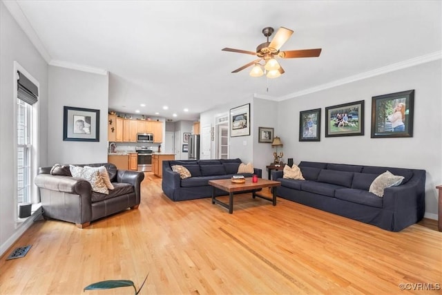 24000 Pear Orchard Rd, Moseley, VA 23120 - living room featuring light wood finished floors, a ceiling fan, and crown molding