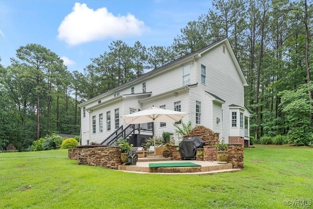 24000 Pear Orchard Rd, Moseley, VA 23120 - back of property with a yard, a patio, and a wooden deck