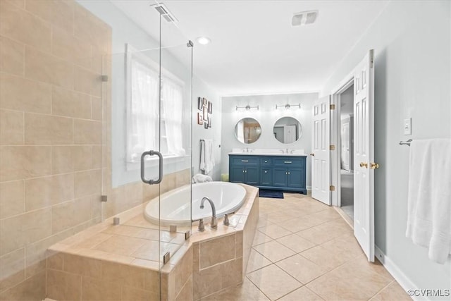 24000 Pear Orchard Rd, Moseley, VA 23120 - bathroom featuring vanity, tile patterned floors, a shower stall, and a garden tub