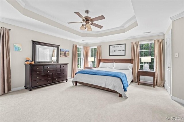 24000 Pear Orchard Rd, Moseley, VA 23120 - carpeted bedroom featuring a raised ceiling, ornamental molding, and ceiling fan