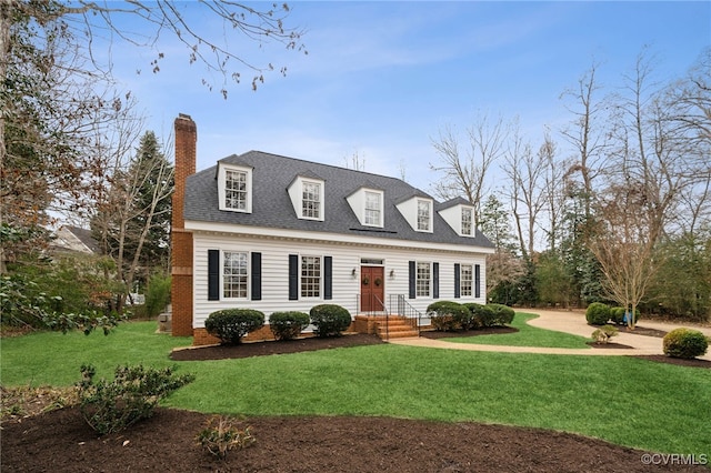 88 Holly Grv, Jamestown, VA 23185 - cape cod home featuring a chimney, a front yard, and roof with shingles