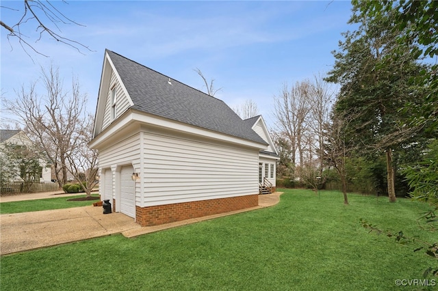 88 Holly Grv, Jamestown, VA 23185 - view of side of home with a shingled roof, concrete driveway, a yard, and entry steps