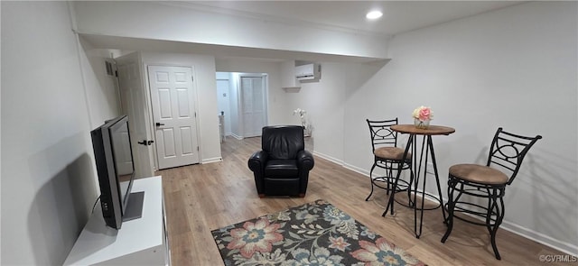 7464 Dutch Lily Ct, Mechanicsville, VA 23111 - living area featuring a wall mounted air conditioner, light wood finished floors, and recessed lighting