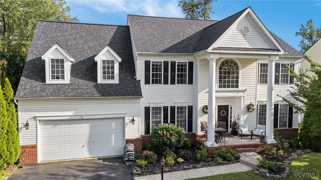 11916 Big Ben Blvd, Fredericksburg, VA 22407 - view of front of property with brick siding, roof with shingles, driveway, and an attached garage