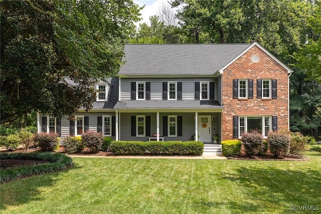 13904 Sunrise Bluff Rd, Chesterfield, VA 23112 - view of front of property with covered porch, a front lawn, and brick siding