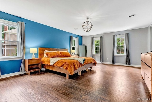 13904 Sunrise Bluff Rd, Chesterfield, VA 23112 - bedroom featuring a chandelier and wood finished floors