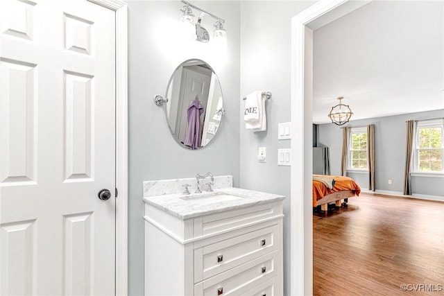13904 Sunrise Bluff Rd, Chesterfield, VA 23112 - bathroom with vanity and wood finished floors