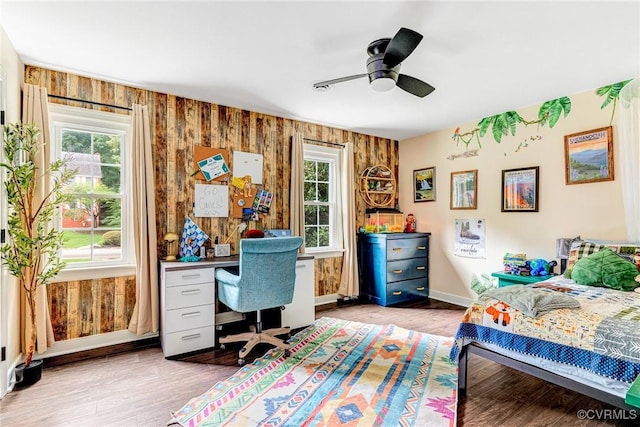 13904 Sunrise Bluff Rd, Chesterfield, VA 23112 - bedroom featuring multiple windows, light wood-type flooring, and an office area