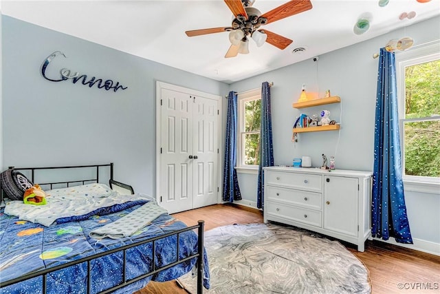 13904 Sunrise Bluff Rd, Chesterfield, VA 23112 - bedroom featuring light wood-style flooring, a closet, and ceiling fan