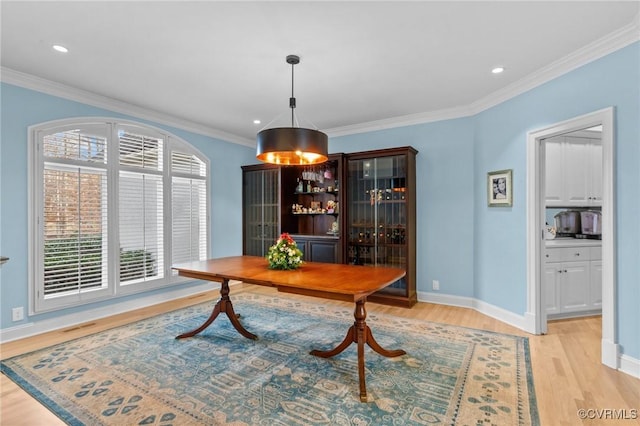 3808 Solebury Pl, Midlothian, VA 23113 - dining room with light wood finished floors, ornamental molding, and recessed lighting