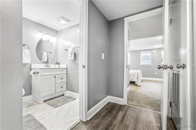 21405 Chesterfield Ave, Chesterfield, VA 23803 - bathroom with vanity, a heating unit, and ensuite bathroom