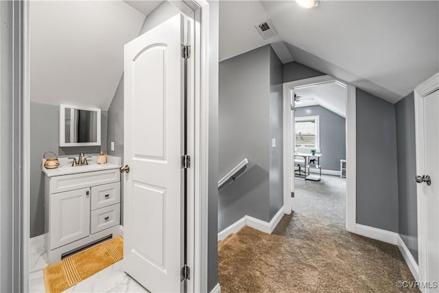21405 Chesterfield Ave, Chesterfield, VA 23803 - bathroom featuring vaulted ceiling and vanity