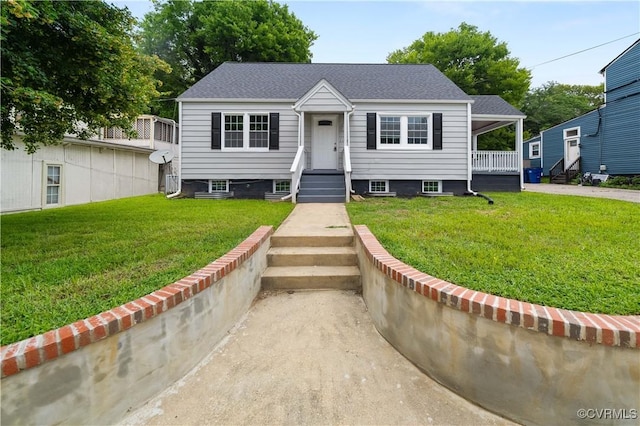 21405 Chesterfield Ave, Chesterfield, VA 23803 - bungalow-style home featuring a front lawn and a shingled roof
