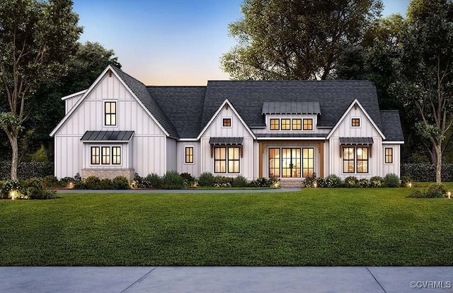 18122 Dogwood Trail Way, Hanover, VA 23146 - view of front of house with board and batten siding, a yard, a standing seam roof, and a metal roof