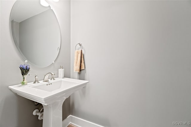 13213 Garland Ln, Midlothian, VA 23114 - bathroom featuring baseboards and a sink