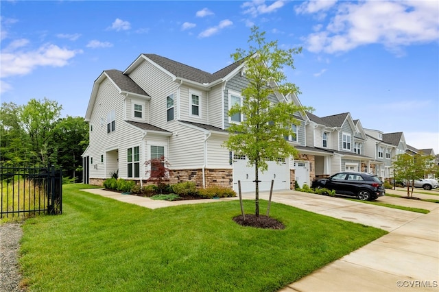 18517 Palisades Rdg, Moseley, VA 23120 - traditional home with concrete driveway, a residential view, an attached garage, and roof with shingles