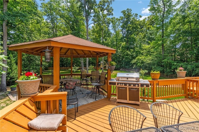 3541 Kings Farm Dr, Midlothian, VA 23113 - wooden deck featuring outdoor dining space, a gazebo, view of scattered trees, and area for grilling