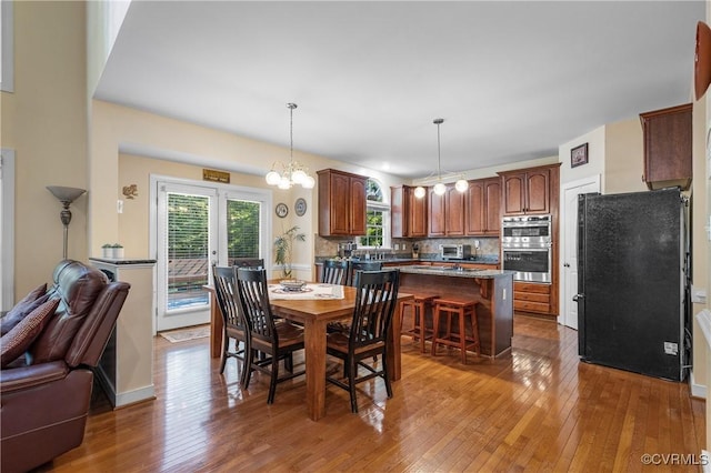 3541 Kings Farm Dr, Midlothian, VA 23113 - dining area featuring hardwood / wood-style floors and a chandelier