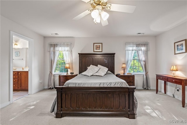 3541 Kings Farm Dr, Midlothian, VA 23113 - bedroom featuring light carpet, multiple windows, and connected bathroom