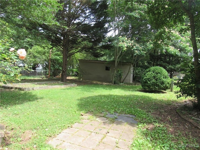 10212 Sauna Dr, North Chesterfield, VA 23236 - view of yard with an outbuilding