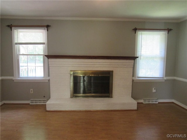 10212 Sauna Dr, North Chesterfield, VA 23236 - unfurnished living room featuring wood finished floors, plenty of natural light, a fireplace, and crown molding