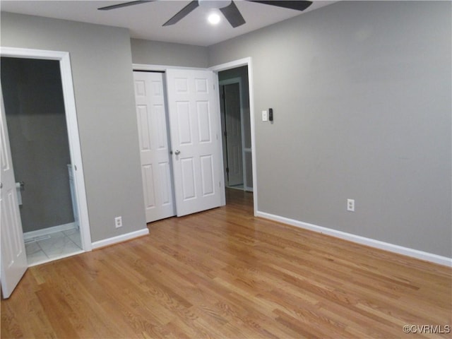 10212 Sauna Dr, North Chesterfield, VA 23236 - unfurnished bedroom with light wood finished floors, ensuite bathroom, and ceiling fan