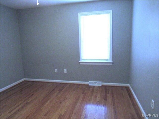 10212 Sauna Dr, North Chesterfield, VA 23236 - unfurnished room with wood finished floors and baseboards