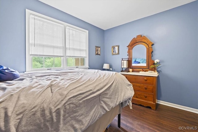 5205 Jerral Dr, Prince George, VA 23875 - bedroom with baseboards and dark wood-style floors