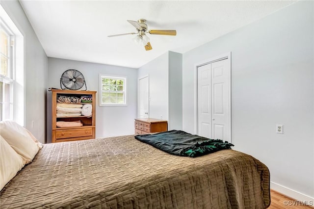 9118 Epps Rd, Mechanicsville, VA 23111 - bedroom featuring wood finished floors, a closet, and a ceiling fan