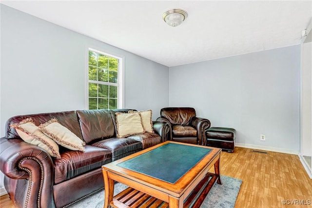 9118 Epps Rd, Mechanicsville, VA 23111 - living area with baseboards and light wood-style flooring