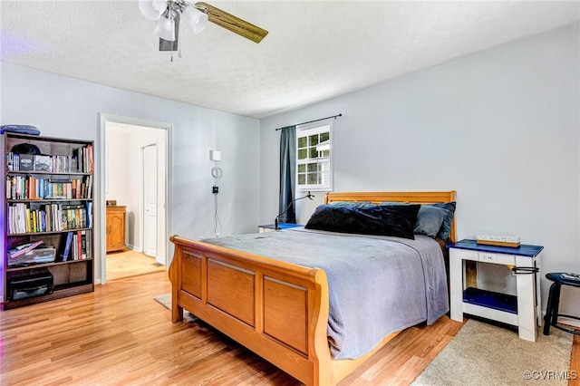 9118 Epps Rd, Mechanicsville, VA 23111 - bedroom featuring light wood-type flooring, ceiling fan, and a textured ceiling