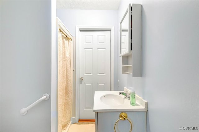 9118 Epps Rd, Mechanicsville, VA 23111 - bathroom with vanity and a shower with shower curtain