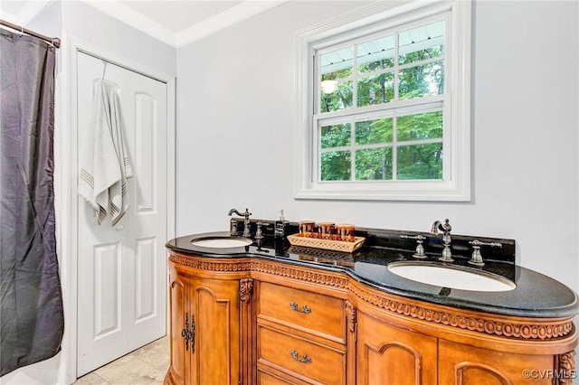 9118 Epps Rd, Mechanicsville, VA 23111 - full bath featuring double vanity, a shower with shower curtain, and tile patterned flooring