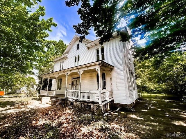 22446 E Depot St, Newsoms, VA 23874 - italianate house with covered porch
