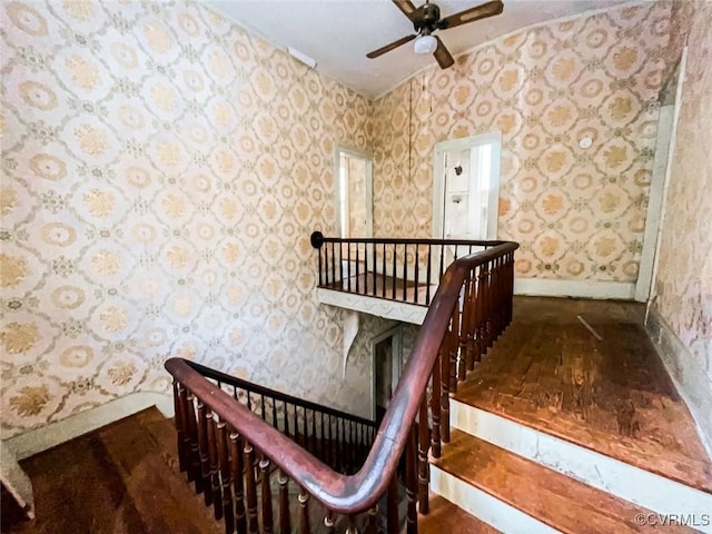 22446 E Depot St, Newsoms, VA 23874 - stairs with a ceiling fan and wallpapered walls
