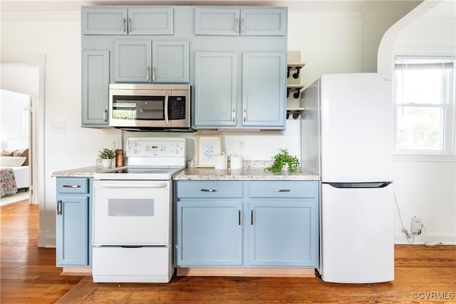 2711 Maplewood Rd, Henrico, VA 23228 - kitchen with white appliances, blue cabinets, dark wood finished floors, ornamental molding, and light stone countertops