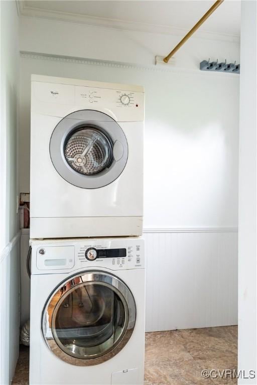 2711 Maplewood Rd, Henrico, VA 23228 - laundry area featuring stacked washer / dryer, a wainscoted wall, and ornamental molding